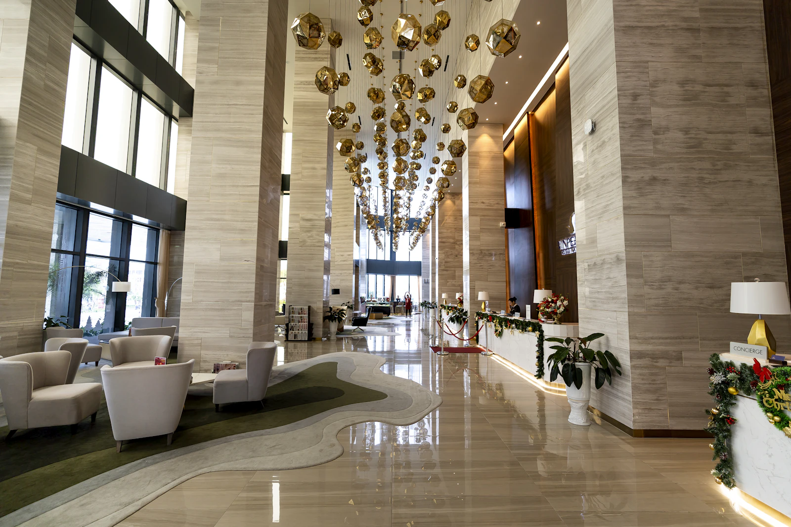 Warmly lit hotel lobby with architectural details